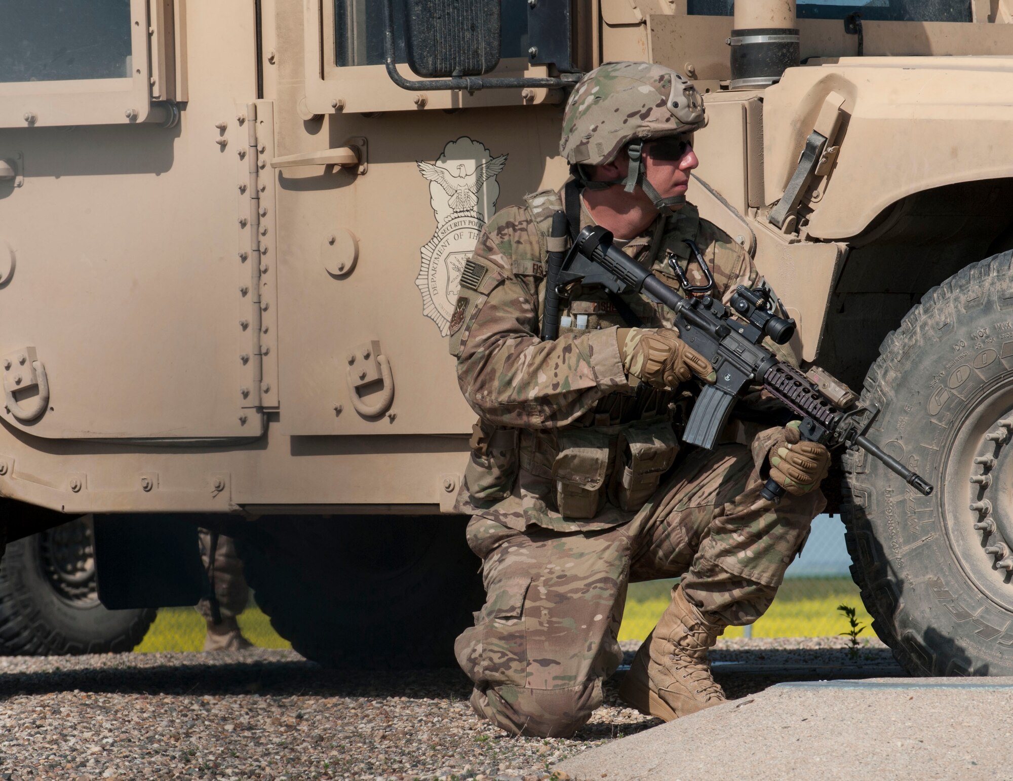 A 91st Missile Wing Security Forces Group member stands guard during an exercise near Donnybrook, N.D., June 29, 2015. During the exercise, the Airmen from the 91st MW Missile Security Forces Squadron, 219th SFS and 791st MSFS worked together to apprehend personnel dressed as simulated aggressors and re-capture a launch facility.  (U.S. Air Force photo/Senior Airman Stephanie Morris)