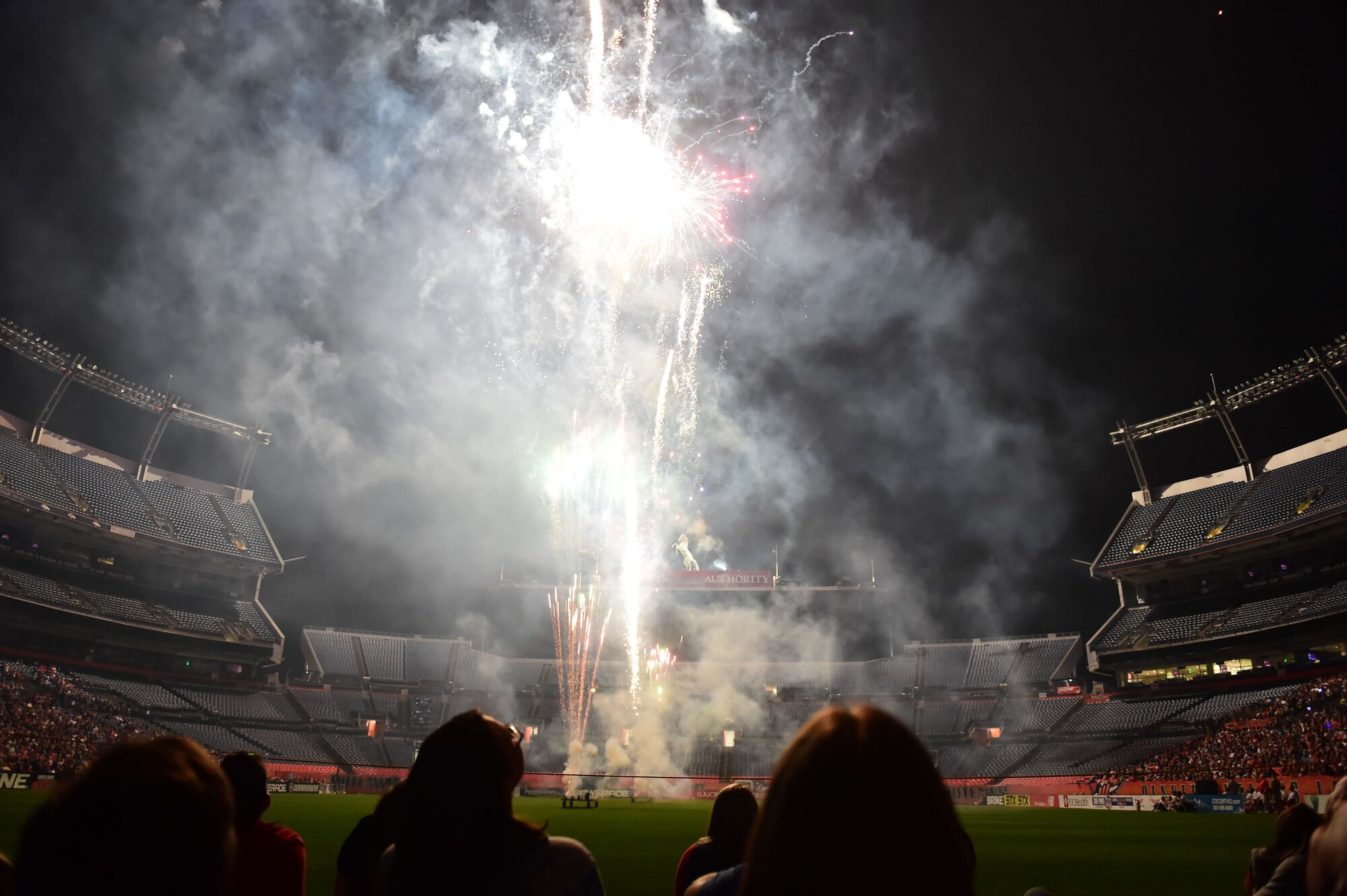 A fireworks display was provided for fans who attended the Denver Outlaws lacrosse game July 4, 2015, at Sports Authority Field at Mile High Stadium in Denver. The Outlaws played the Boston Cannons and honored military members after the game. (U.S. Air Force photo by Airman 1st Class Luke W. Nowakowski/Released)