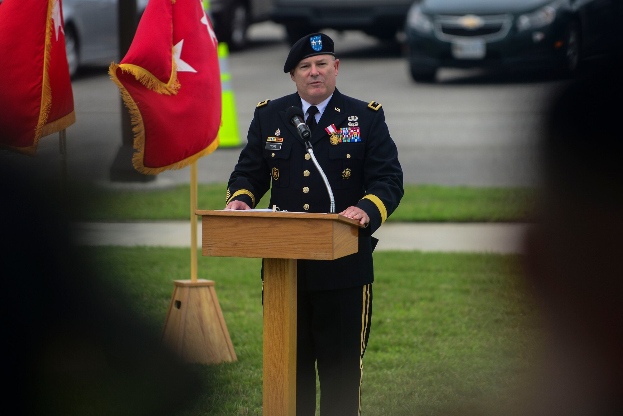 U.S. Army Maj. Gen. Ross Ridge, Center for Initial Military Training outgoing commander speaks during a change of command ceremony at Fort Eustis, Va., July 2, 2015. Ridge spoke to the crowd after his change of command and retirement, thanking all those he said made his career possible.  (U.S. Air Force photo by Senior Airman Kimberly Nagle/Released)