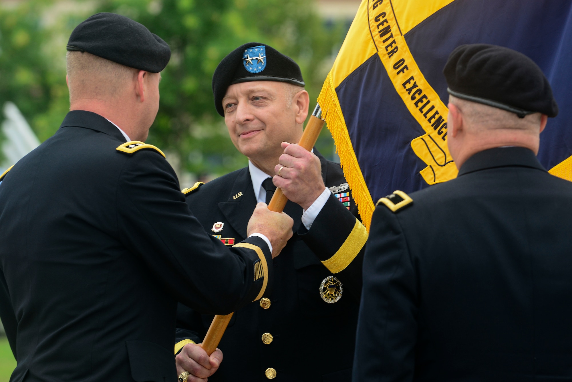U.S. Army Maj. Gen. Anthony Funkhouser, Center for Initial Military Training incoming commander, takes command during a change of command ceremony at Fort Eustis, Va., July 2, 2015. Funkhouser assumed command from Maj. Gen. Ross Ridge, CIMT outgoing commander, following an assignment as the 95th commandant of the U.S. Army Engineer School. (U.S. Air Force photo by Senior Airman Kimberly Nagle/Released)