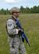 An Airman assigned to the 435th Security Forces Squadron, Ramstein Air Base, Germany, conducts security operations after parachuting from a C-130J Hercules aircraft during an austere landing exercise in Nurmsi, Estonia during Saber Strike 15, June 11, 2015. Members of the 435th Contingency Response Group trained to secure and assess an area for suitability as a landing strip for follow on aircraft. (Air National Guard photo by Tech. Sgt. Christopher Schepers)