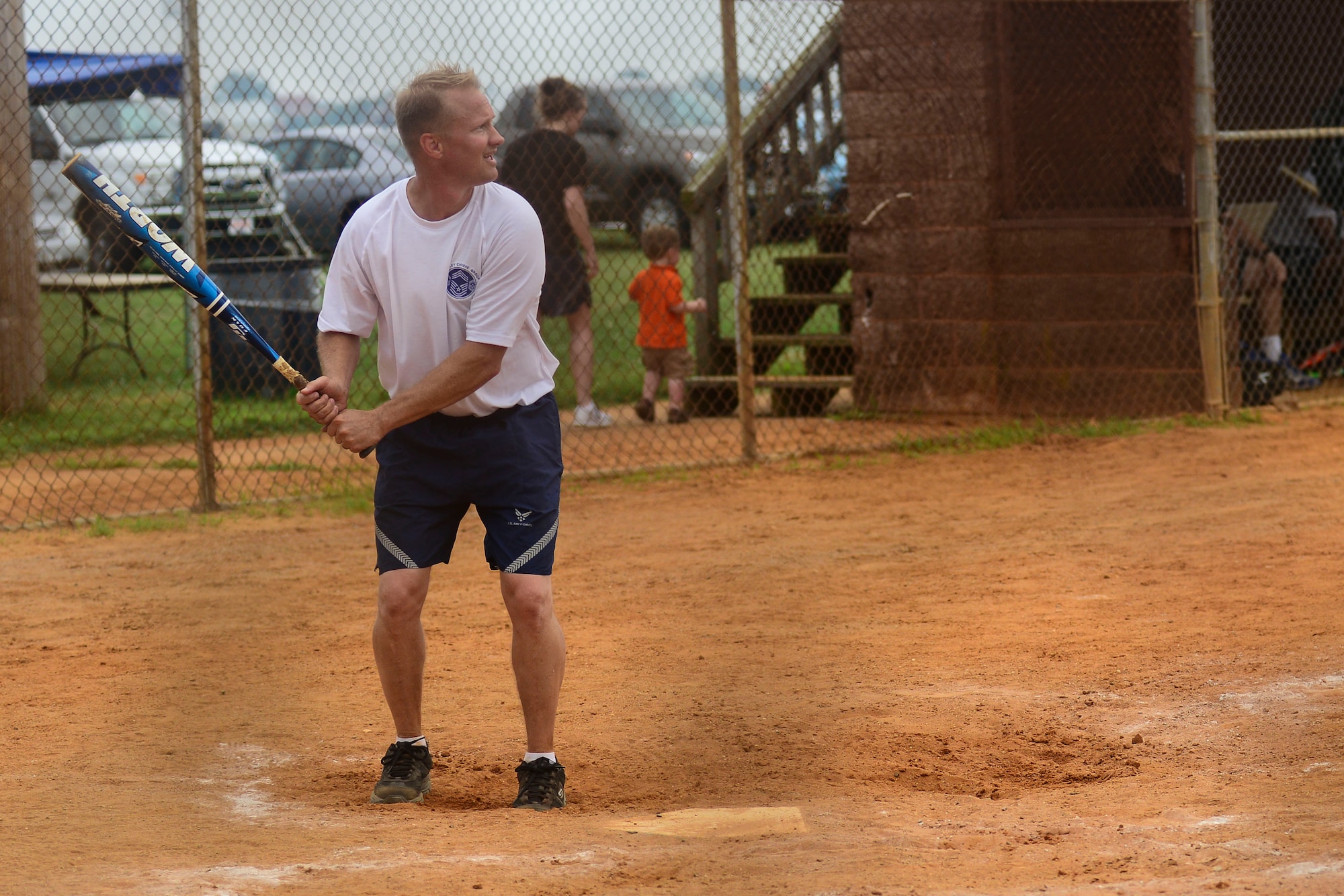 U.S. Air Force Chief Master Sgt. Mark Hurst, 633rd Air Base Wing command chief, participates in a softball game during a base-wide Warrior Day at Langley Air Force Base, Va., July 2, 2015.  Hurst took part in the “eagles and chiefs verses Airmen” softball game, one of many events held throughout the day.  (U.S. Air Force photo by Senior Airman Kimberly Nagle/Released)