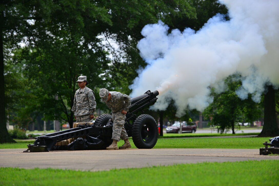 U.S. Army Soldiers from the 7th Transportation Brigade (Expeditionary) Salute Battery fire cannon rounds during the Salute to the Nation Ceremony at Seay Plaza on Fort Eustis, Va., July 4, 2015. The ceremony honored each state’s entry into the union with cannon fire. (U.S. Air Force photo by Staff Sgt. Natasha Stannard/Released)