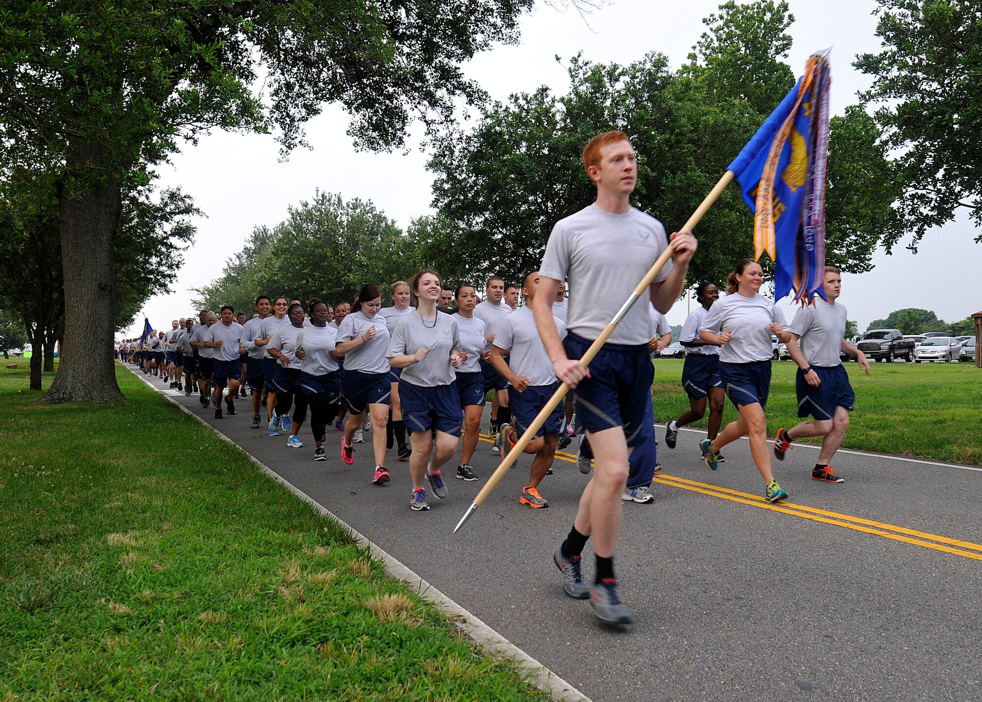 U.S. Air Force Airmen participate in the Warrior Day formation run at Langley Air Force Base, Va., July 2, 2015. Warrior Day was done as a way for Airmen to meet others and boost morale and increase camaraderie. (U.S. Air Force photo by Senior Airman Breonna Veal/Released)