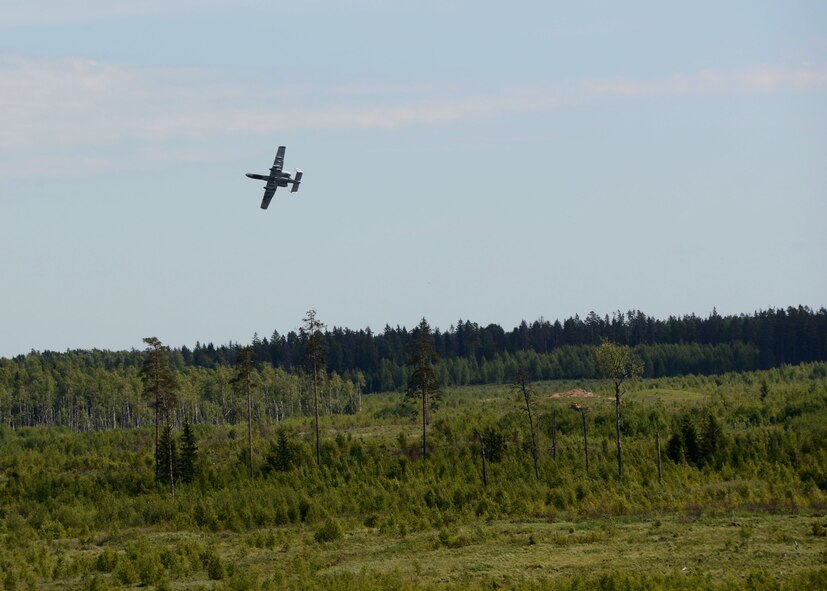 An A-10C Thunderbolt II aircraft assigned to the 104th Fighter Squadron, Maryland Air National Guard, approaches the range in Tapa, Estonia during a flying mission for Saber Strike 15, June 9, 2015. Saber Strike is an exercise that aims to continue to improve U.S. interoperability with ally and partner nations, while increasing their capacity to conduct a full spectrum of military operations (Air National Guard photo by Tech. Sgt. Christopher Schepers)