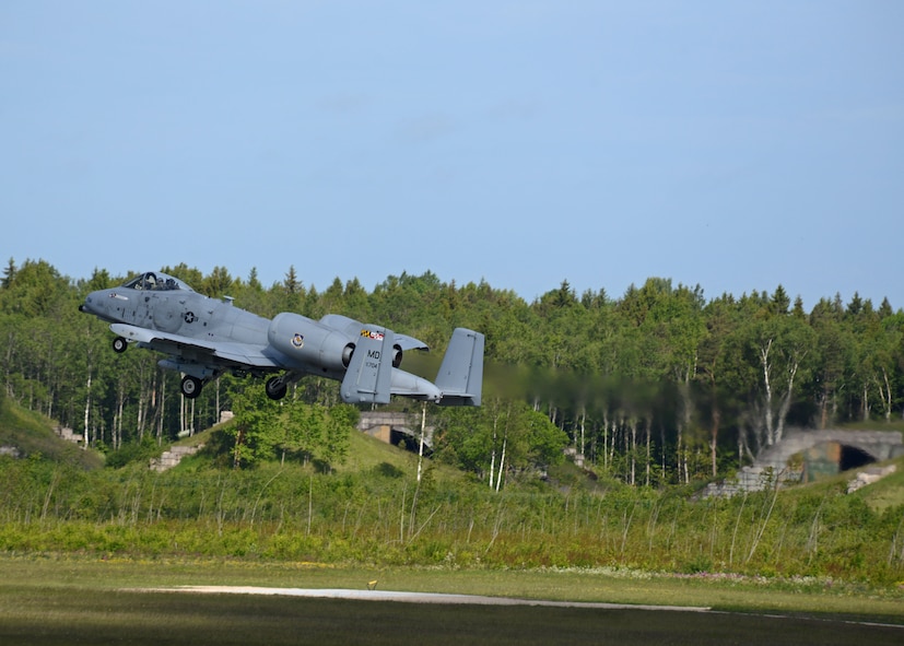 An A-10C Thunderbolt II assigned to the104th Fighter Squadron, Maryland Air National Guard, takes off for a training mission during Saber Strike 15 from Ämari Air Base, Estonia, June 8, 2015. Saber Strike is an exercise that aims to continue to improve U.S., allied partners, and participating nations' interoperability, while increasing their capacity to conduct a full spectrum of military operations. (Air National Guard photo by Tech. Sgt. Christopher Schepers)