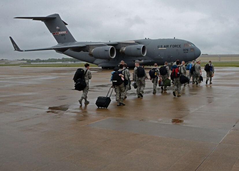 Members of the 175th Wing, Maryland Air National Guard, Baltimore, Md. prepare to board a C-17 at Warfield Air National Guard Base, Baltimore, Md., June 2, 2015 to travel to Estonia for Saber Strike 15. Saber Strike is an exercise that aims to continue to improve U.S., allied partners, and participating nations' interoperability, while increasing their capacity to conduct a full spectrum of military operations. (Air National Guard photo by Tech. Sgt. Christopher Schepers)