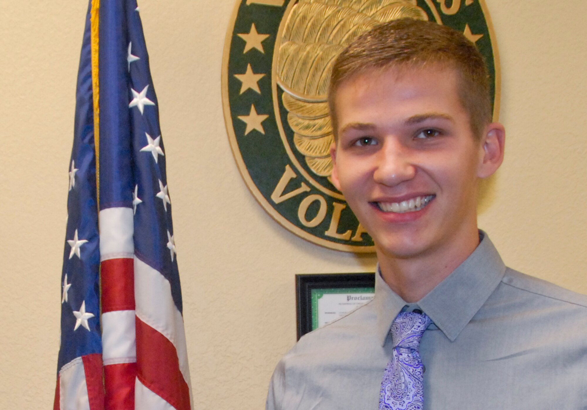 Tyler Riles, son of Lewis Riles, a member of the Air Force Life Cycle Management Center, received a $1,000 scholarship from the 2015 Air Force Club Membership Scholarship Program July 7 at Eglin Air Force Base, Fla.  Riles was the only local winner in the Air Force-wide program.  The program awards 25 scholarships annually.  (U.S. Air Force photo/Kevin Gaddie)   