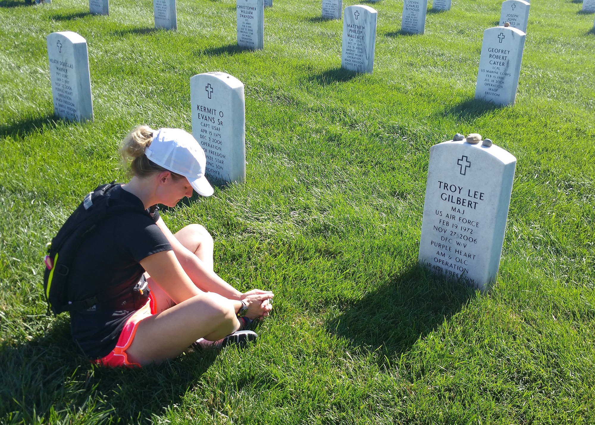 Maj. Jenny Poisson visited Maj. Troy Gilbert’s gravesite in Gettysburg, Pennsylvania, after a 22 mile run in July 2015. Gilbert was killed Nov. 27, 2006, when his F-16C Fighting Falcon crashed 20 miles northwest of Baghdad, Iraq, while engaged in support of coalition ground combat operations. (Courtesy photo)