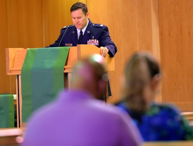 Chaplain Daniel Thompson offers a prayer for peace during the prayer vigil in the chapel on June 25, 2015 at JB Charleston, S.C. The vigil was conducted to support the nine victims of the shooting that occurred at the Emanuel African Methodist Episcopal Church in downtown Charleston, S.C. on June 14th.