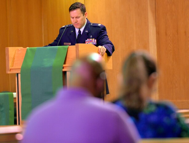 Chaplain Daniel Thompson offers a prayer for peace during the prayer vigil in the chapel on June 25, 2015 at JB Charleston, S.C. The vigil was conducted to support the nine victims of the shooting that occurred at the Emanuel African Methodist Episcopal Church in downtown Charleston, S.C. on June 14th.
