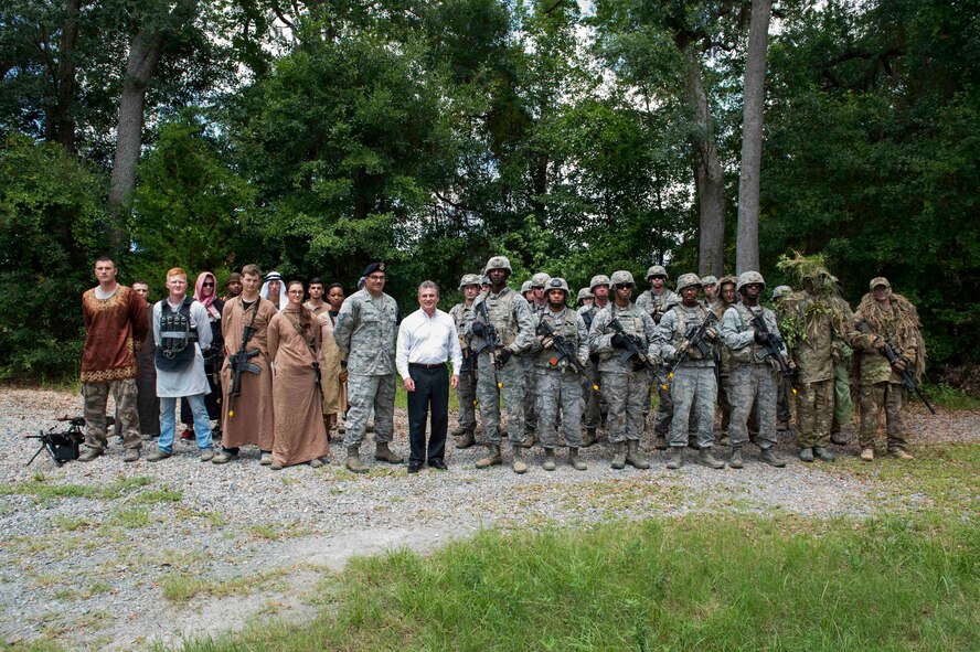 U.S. Rep. Buddy Carter of Georgia, poses for a group photo with Airmen from the 820th Base Defense Group after a military operations in urban terrain demonstration July 2, 2015, at Moody Air Force Base, Ga. Carter visited Moody to view its mission capabilities and voice them to Congress. (U.S. Air Force photo by Airman 1st Class Dillian Bamman/Released)