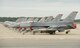 F-16C Fighting Falcons from the 52nd Fighter Wing Spangdahlem Air Base Germany line the flightline at Pease Air National Guard Base, N.H., on July 7, 2015.  A contingent of the Spangdahlem-based aircraft landed at Pease while in transit to a training exercise in the United States. The 52 FW supports the supreme allied commander Europe with mission-ready personnel and systems providing expeditionary air power for suppression of enemy air defenses, close air support, air interdiction, counter air, air strike control, strategic attack, combat search and rescue, and theater airspace control. The wing also supports contingencies and operations other than war as required. (U.S. Air National Guard Base photo by Staff Sgt. Curtis J. Lenz)