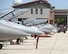 A U.S. Air Force Airman from the 480th Aircraft Maintenance Unit, 52nd Aircraft Maintenance Squadron Spangdahlem Air Base, Germany looks into a cockpit of a F-16C Fighting Falcon at Pease Air National Guard Base, N.H., on July 6, 2015.  A contingent of the Spangdahlem-based aircraft landed at Pease while in transit to a training exercise in the United States. The 52 FW supports the supreme allied commander Europe with mission-ready personnel and systems providing expeditionary air power for suppression of enemy air defenses, close air support, air interdiction, counter air, air strike control, strategic attack, combat search and rescue, and theater airspace control. The wing also supports contingencies and operations other than war as required. (U.S. Air National Guard Base photo by Staff Sgt. Curtis J. Lenz/RELEASED)