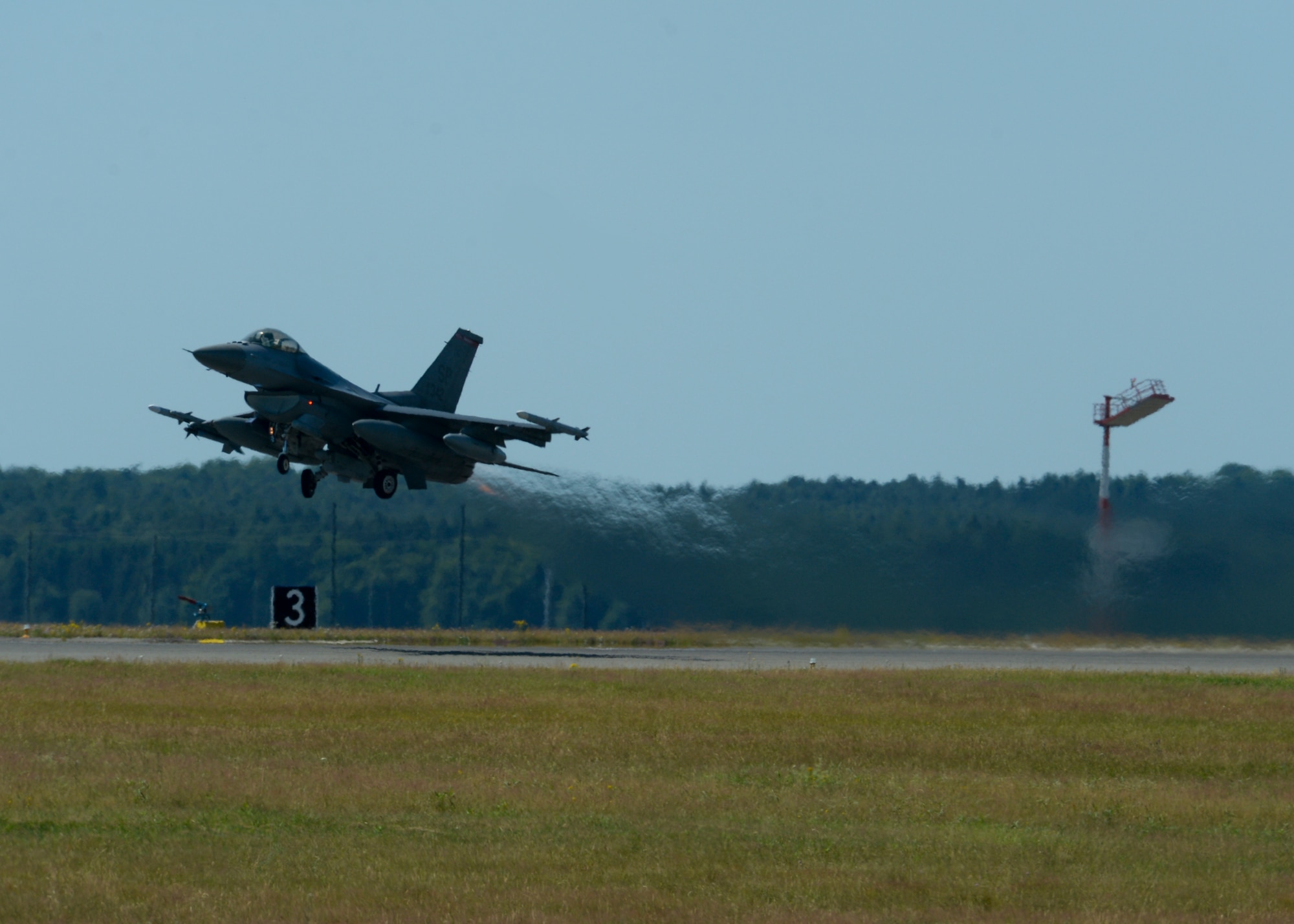 A U.S. Air Force F-16 Fighting Falcon fighter aircraft assigned to the 480th Fighter Squadron takes off from the flightline at Spangdahlem Air Base, Germany, July 6, 2015. The aircraft will participate in Red Flag, an exercise which gives pilots an experience of multiple, intensive air combat sorties in the safety of a training environment. (U.S. Air Force photo by Staff Sgt. Joe W. McFadden/Released)