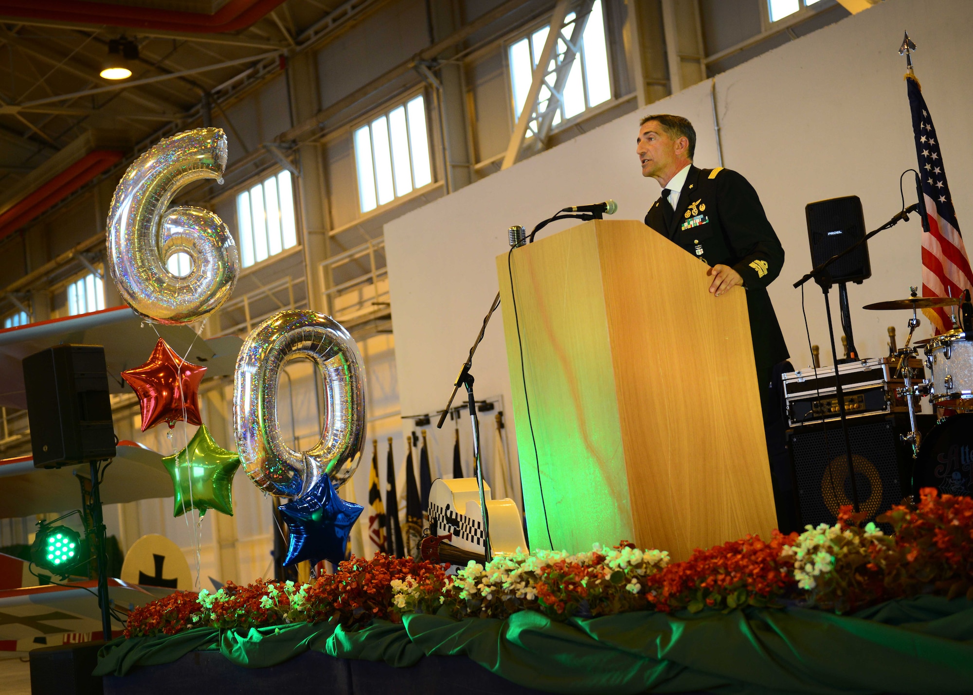 Italian Air Force Maj. Gen. Nicola Lanza de Cristoforis, 1st Air Region commander, gives opening remarks during the 60th Anniversary celebration, July 3, 2015, at Aviano Air Base, Italy. The event enabled nearly 300 Italian and U.S. guests to celebrate the partnership between both nations. (U.S. Air Force photo by Airman 1st Class Deana Heitzman/Released)