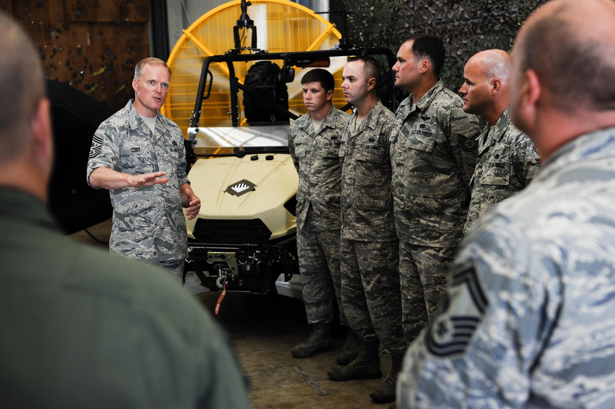 Chief Master Sgt. of the Air Force James Cody speaks to Airmen of the 353rd Special Operations Group July 8, 2015, on Kadena Air Base, Japan. As part of his ongoing initiative to engage with enlisted Airmen stationed around the globe, the chief will be continuing his tour through the Pacific Air Forces once he leaves Kadena. (U.S. Air Force photo by Airman 1st Class John Linzmeier)