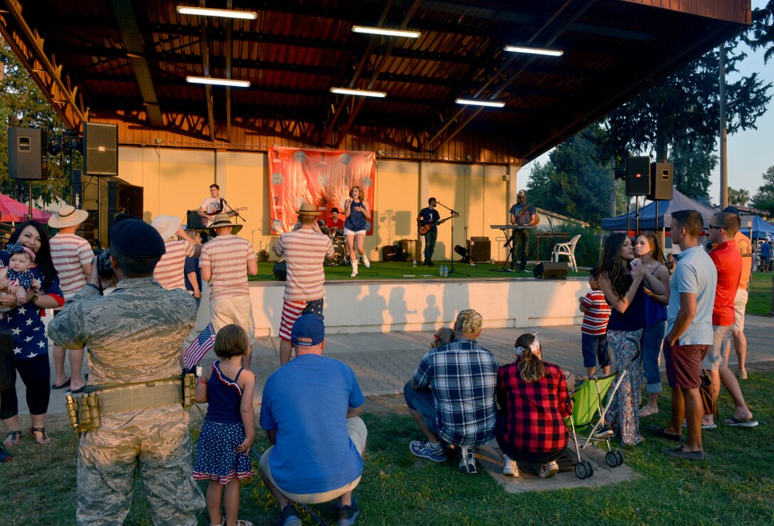 Alaina Blair, American singer and Armed Forces Entertainment performer, performs a song from her new album during a 4th of July Festival July 4, 2015, at Incirlik Air Base, Turkey. Along with Incirlik, Blair has performed for service members in Djibouti, Kuwait, Bahrain, Qatar, UAE, Turkey, Jordan, and Egypt. (U.S. Air Force photo by Senior Airman Michael Battles/Released)