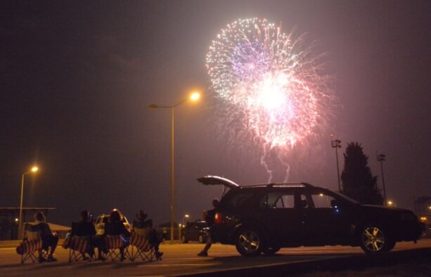 Members of Team Incirlik watch a firework display during a 4th of July Festival July 4, 2015, at Incirlik Air Base, Turkey. Festival events included a pie eating contest, raffle, food and beverage booths, fireworks and a performance by special guest Alaina Blair, American singer and Armed Forces Entertainment performer. (U.S. Air Force photo by Senior Airman Michael Battles/Released)