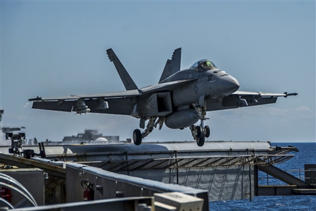 An F/A-18E Super Hornet launches from the flight deck of the aircraft carrier USS George Washington during Talisman Sabre 2015 in the Timor Sea, July 7, 2015. The Hornet is assigned to Strike Fighter Squadron 115.
