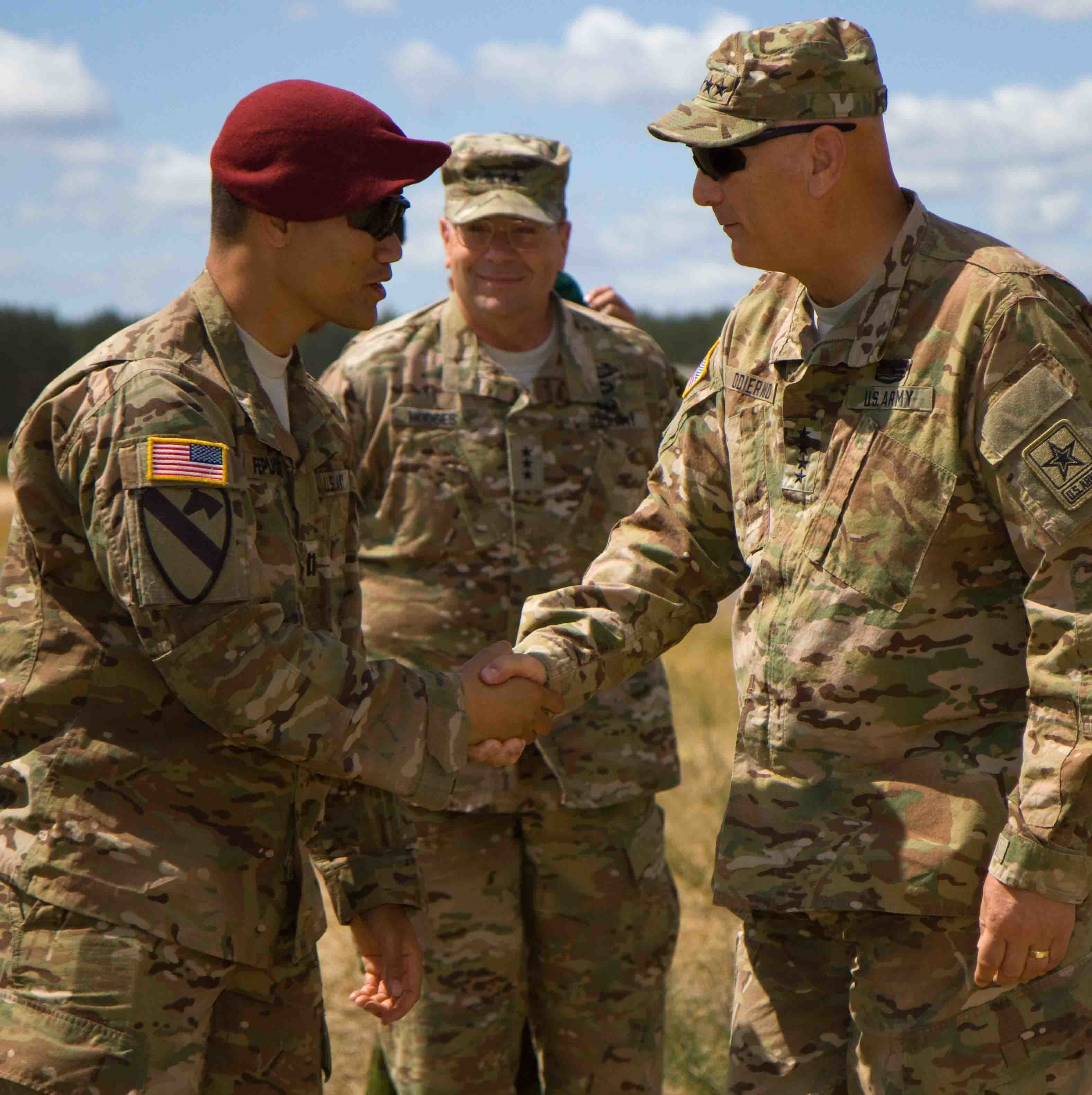 U.S. Army Chief of Staff Gen. Ray Odierno, right, shakes hands with ...