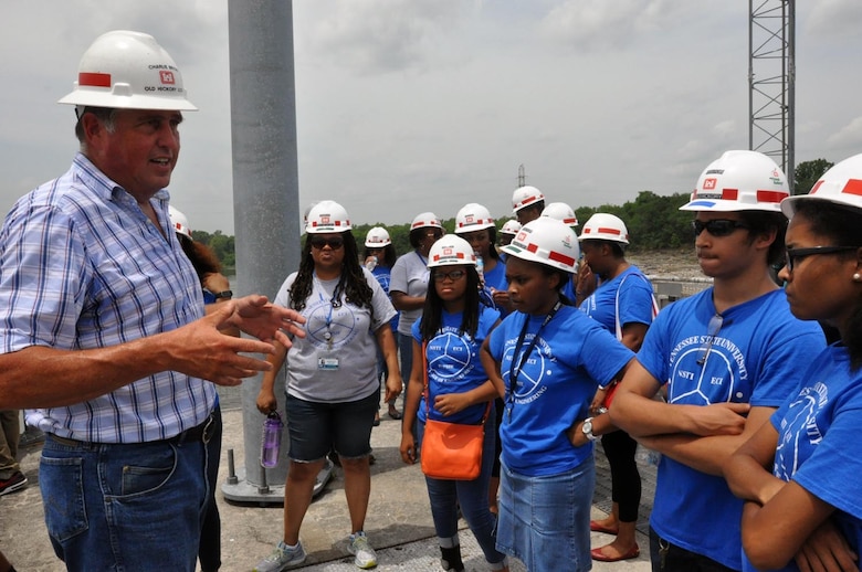 Charlie Byran, U.S. Army Corps of Engineers Nashville District, lock master,talks with students from Tennessee State University Engineering Department's four-week National Summer Transportation Institute program about inland water navigation and locking boat procedures June 24, 2015.