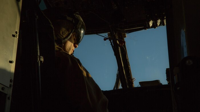 Capt. Joseph Tremaine, a CH-53E Super Stallion pilot with Marine Heavy Helicopter Squadron (HMH) 466, conducts preflight checks aboard Marine Corps Air Station Miramar, California, July 2. The aircrew prepares the aircraft for night fast-rope training on Marine Corps Base Camp Pendleton, California.