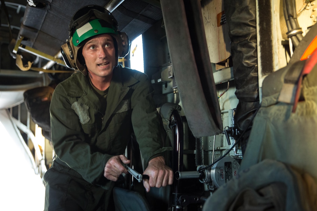Lance Cpl. Marshall Cheatham, an airframes mechanic with Marine Heavy Helicopter Squadron (HMH) 466, performs maintenance on a CH-53E Super Stallion aboard Marine Corps Air Station Miramar, California, July 2. The aircrew prepares the aircraft for night fast-rope training on Marine Corps Base Camp Pendleton, California.