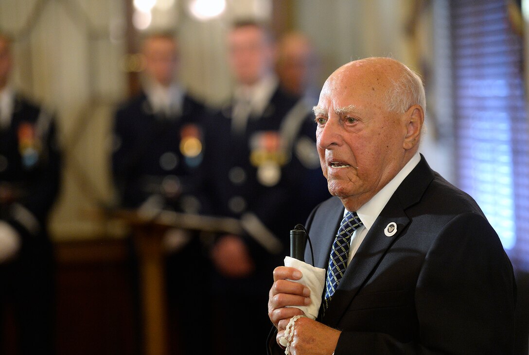 Second Lt. John Pedevillano, a WWII Army Air Corps B-17 bombardier, makes remarks after Air Force Vice Chief of Staff Gen. Larry O. Spencer and Sen. John McCain presented him the Presidential Unit Citation with one oak leaf cluster in Washington, D.C., July 7, 2015. Pedevillano accepted the award as the last survivor of his WWII unit. (U.S. Air Force photo/Scott M. Ash)