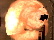A high-speed camera captures the first full-energy shots from the Office of Naval Research-funded electromagnetic railgun prototype launcher that was recently installed at a test facility in Dahlgren, Va. The test shots begin a month-long series of full-energy tests to evaluate the first of two industry-built launchers that will help bring the Navy a step closer to producing a next-generation, long-range weapon for surface ships. The new launcher brings advanced material and high-power technologies in a system that now resembles a large-caliber gun. 