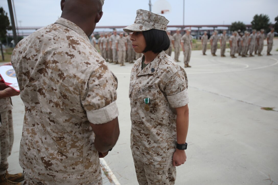 Marines with the 13th Marine Expeditionary Unit are presented with awards and promoted aboard Marine Corps Base Camp Pendleton, Calif., July 1, 2015. While some Marines are awarded for their expertise in their field and creative ideas, while others were promoted receiving even greater responsibilities.(U.S. Marine Corps photo by Lance Cpl. Alvin Pujols/Released) 