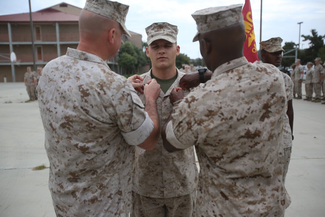 Marines with the 13th Marine Expeditionary Unit are presented with awards and promoted aboard Marine Corps Base Camp Pendleton, Calif., July 1, 2015. While some Marines are awarded for their expertise in their field and creative ideas, while others were promoted receiving even greater responsibilities. 