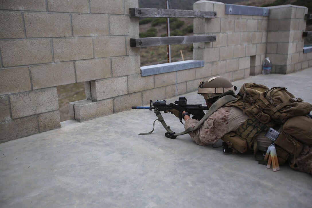 Marines with the 13th Marine Expidtionary Unit Maritime Raid Force conduct the final phase of Close Quarters Tactics Course during pre-deployment training aboard Marine Corps Base Camp Pendleton, Calid., June 26, 2015. The 13th MEU is preparing for an upcoming deployment in the CENTCOM and PACOM areas.(U.S. Marine Corps photo by Lance Cpl. Alvin Pujols/Released)