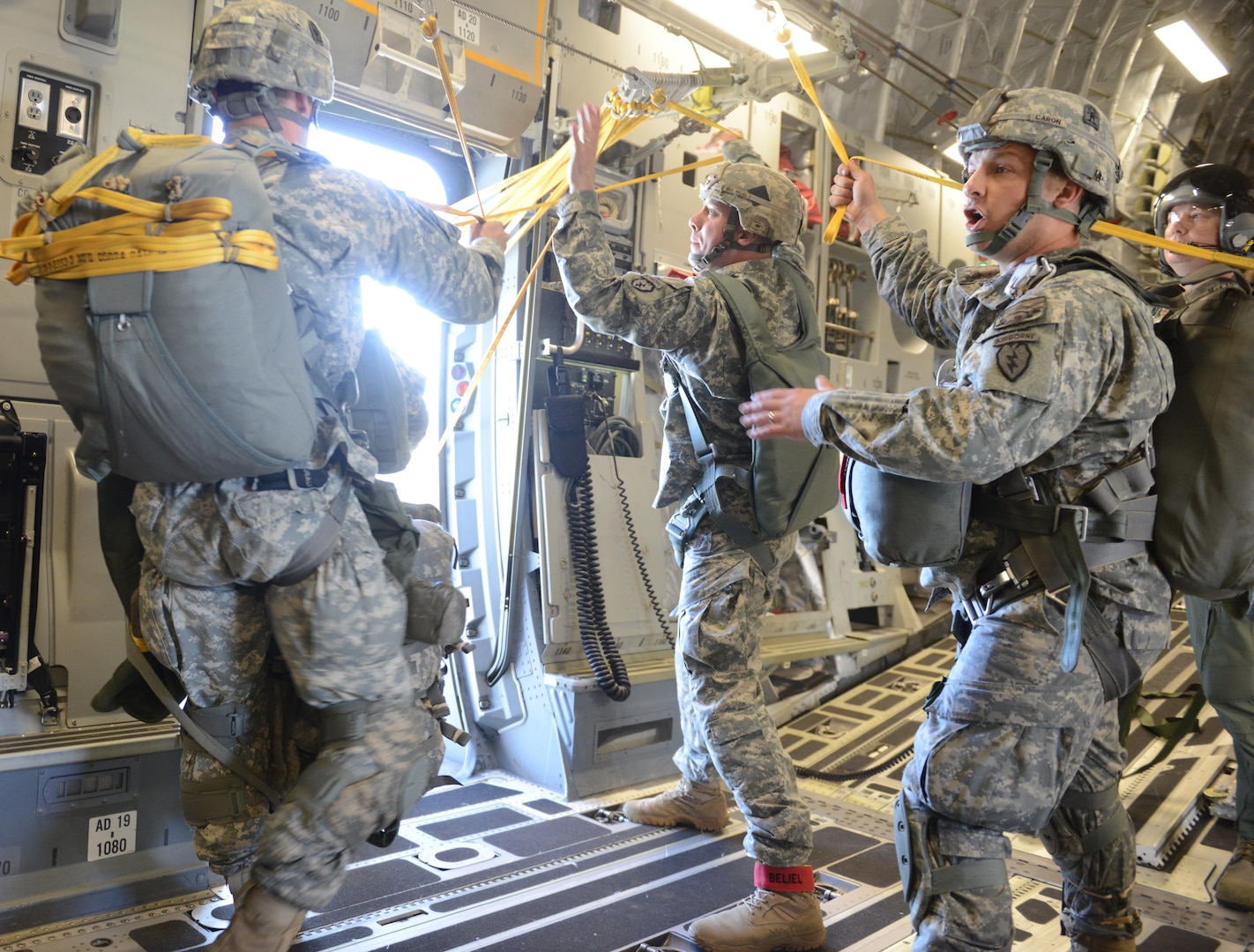 Soldiers of 3rd Battalion, 509th Parachute Infantry Regiment, 4th Infantry Brigade Combat Team (Airborne), 25th Infantry Division, jump from a Royal Australian Air Force C-17 Globemasters into Queensland, Australia, July 8, 2015, as part of exercise Talisman Sabre.