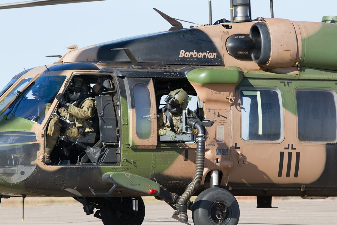 U.S. Air Force Airmen from the 18th Logistics Readiness Squadron from Kadena Air Base, Japan, partnered with the Australian Army during a refueling exercise at the Royal Australian Air Force Base Darwin, July 8, 2015, in Darwin, Australia during Talisman Sabre 2015. Talisman Sabre is a biennial exercise that provides an invaluable opportunity for nearly 30,000 U.S. and Australian defense forces to conduct operations in a combined, joint and interagency environment that will increase both countries’ ability to plan and execute a full range of operations from combat missions to humanitarian assistance efforts. (U.S. Army photo by Sgt. Steven Peterson/Released)