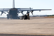 U.S. Air Force Airmen from the 18th Logistics Readiness Squadron from Kadena Air Base, Japan, partnered with the Australian Army during a refueling exercise at the Royal Australian Air Force Base Darwin, July 8, 2015 in Darwin, Australia, during Talisman Sabre 2015. Talisman Sabre is a biennial exercise that provides an invaluable opportunity for nearly 30,000 U.S. and Australian defense forces to conduct operations in a combined, joint and interagency environment that will increase both countries’ ability to plan and execute a full range of operations from combat missions to humanitarian assistance efforts. (U.S. Army photo by Sgt. Steven Peterson/Released)