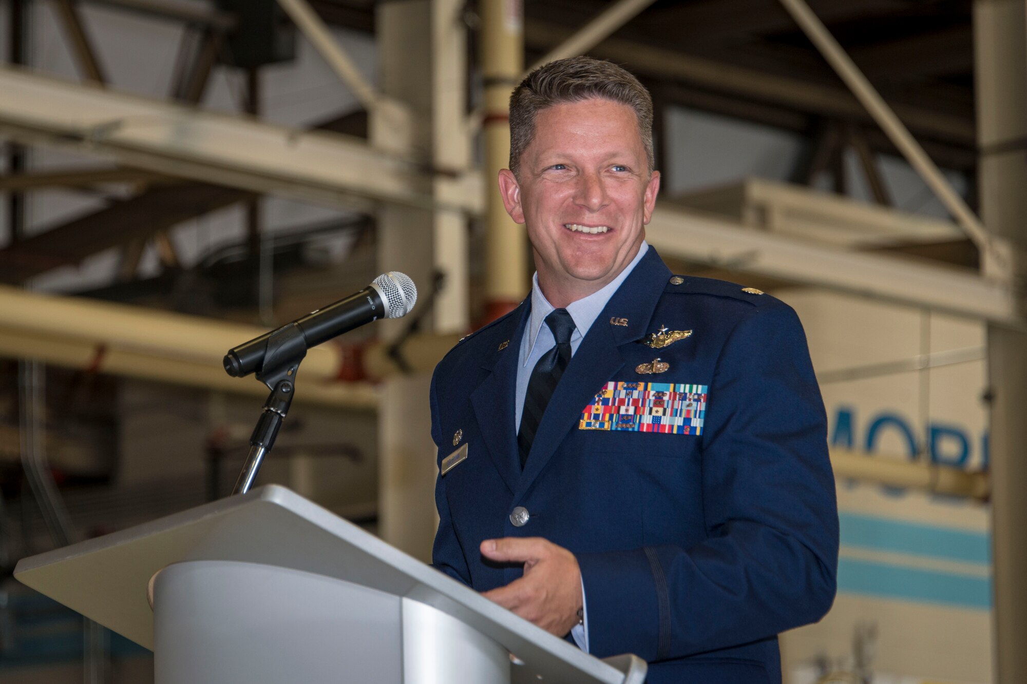 Lt. Col. Matthew Coleman, 92nd Operations Support Squadron commander, explains his priorities and expectations during the 92nd OSS change of command ceremony July 9, 2015, at Fairchild Air Force Base, Wash. Coleman enlisted in the Air Force in 1990 and received his commission in 1998 as a second lieutenant. He is a senior pilot with 2,400 flight hours and has flown the T-37B Tweet, T-1A Jayhawk, KC-135R/T Stratotanker and C-17A Globemaster III. (U.S. Air Force photo/Staff Sgt. Benjamin W. Stratton)