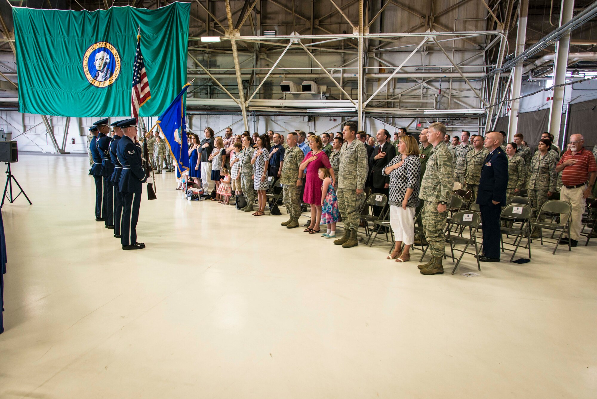 The Fairchild Honor Guard presents the colors during the 92nd Operations Support Squadron change of command ceremony July 9, 2015, at Fairchild Air Force Base, Wash. The Star-Spangled Banner is the national anthem of the United States and has served in this capacity since a congressional resolution on March 3, 1931. Some historians note the song was also used officially by the U.S. Navy as early as 1889. (U.S. Air Force photo/Staff Sgt. Benjamin W. Stratton)