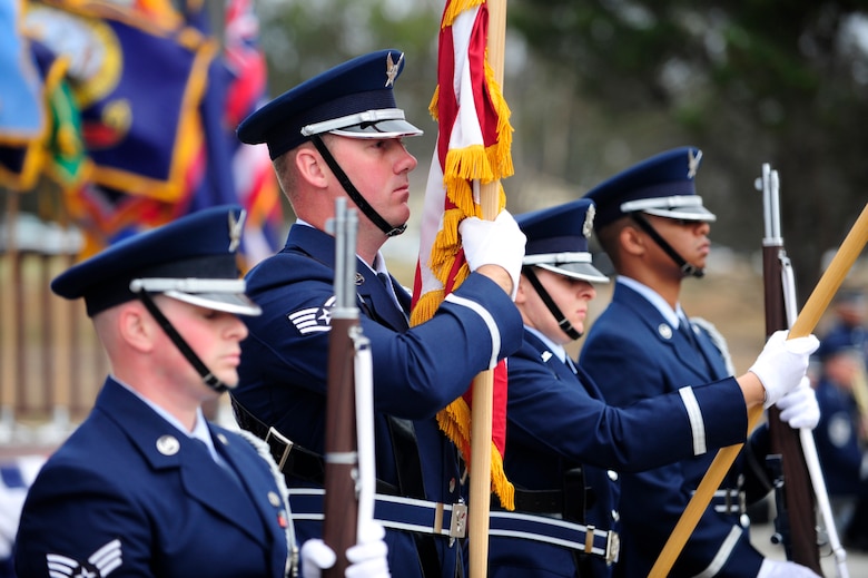 Vandenberg Honor Guard members present the colors during the 30th Space Wing change of command ceremony, July 9, 2015, Vandenberg Air Force Base, Calif. Col. Keith Balts relinquished command of the 30th SW to Col. J. Christopher Moss. (U.S. Air Force photo by Staff Sgt. Jim Araos/Released)