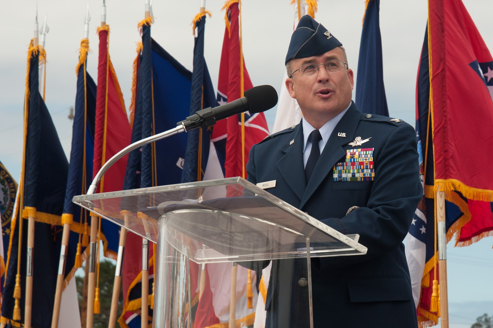 Col. J. Christopher Moss, 30th Space Wing commander, makes his first address as 30th SW commander to a crowd of Vandenberg Airmen and guests during the 30th SW change of command ceremony, July 9, 2015, Vandenberg Air Force Base, Calif. (U.S. Air Force photo by Michael Peterson/Released)
