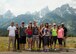 Trip participants of an F.E. Warren Air Force Base Outdoor Recreation trip pose for a group photo with the Teton Range in the background in Grand Teton National Park, Wyo., July 3, 2015. Outdoor Recreation hosted a trip to Grand Teton and Yellowstone National Park for the July 4th weekend which included camping, hiking and sightseeing the natural attractions of the parks. (U.S. Air Force photo by Lan Kim)