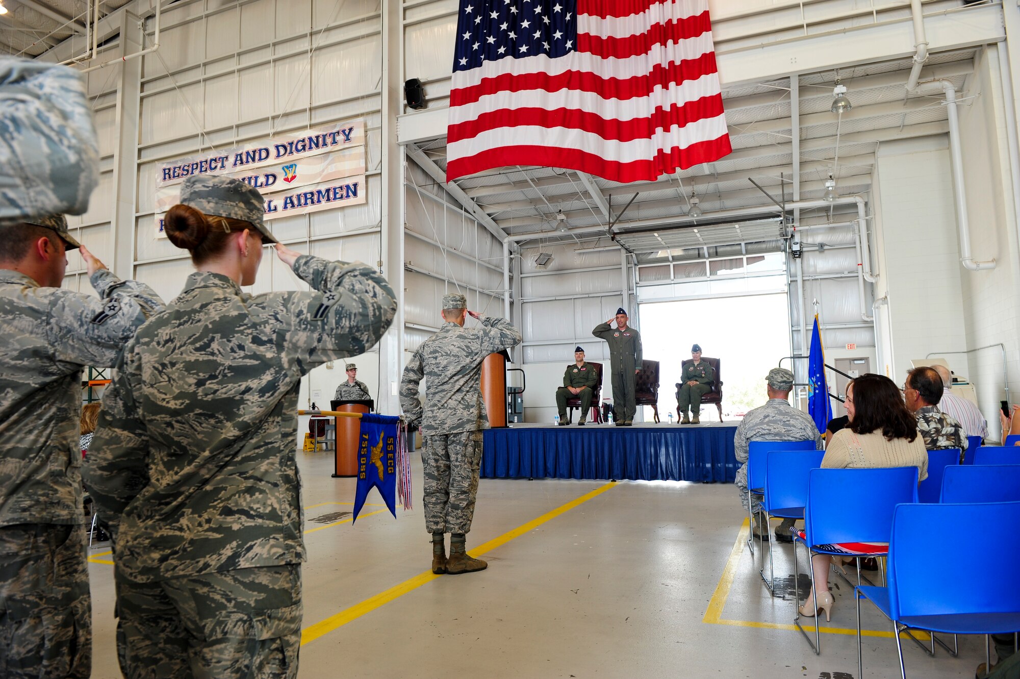 U.S. Air Force Lt. Col. Joshua Koslov, 755th Operations Support Squadron commander, renders his first salute to Airmen from the 755th OSS after assuming command of the squadron during a change of command ceremony at Davis-Monthan Air Force Base, Ariz., July 9, 2015. Before assuming command of the 755th OSS, Koslov served as the director of operations of the 43rd Electronic Combat Squadron. (U.S. Air Force photo by Airman 1st Class Chris Drzazgowski/Released)