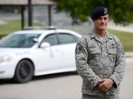 Air Force Reservist Master Sgt. Christopher Enfinger, 47th Security Forces Squadron alternate operations superintendent, poses at the 47th SFS on Laughlin Air Force Base, Texas, July 8, 2015. When not serving in his reservist capacity, Enfinger is one of only 25 officers, detectives, and sergeants assigned to the San Antonio Police Department Gang Unit who is responsible for tracking, documenting and monitoring more than 10,000 gang members and over 30 different gangs throughout San Antonio. (U.S. Air Force photo by Tech Sgt. Steven R. Doty)(Released)