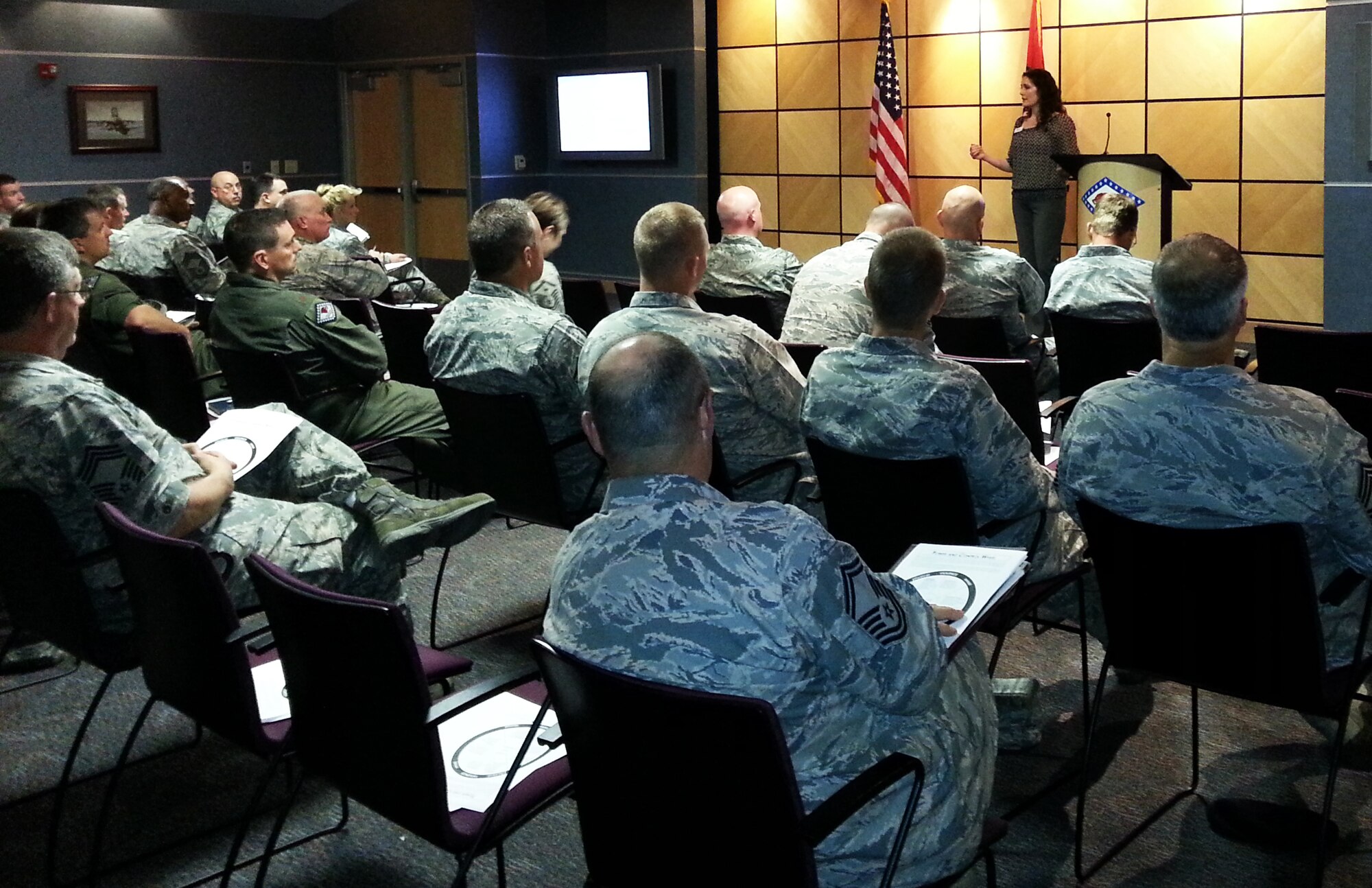 Amy Jo Carr Williams, Donald W. Reynolds Crisis Intervention Center’s shelter director, speaks to 188th Wing leadership about sexual assault and domestic violence at Ebbing Air National Guard Base during June’s unit training assembly. The 188th is partnering with DWRCIC to enhance its sexual assault prevention and response capabilities. (U.S. Air National Guard photo by Maj. Heath Allen/Released) 