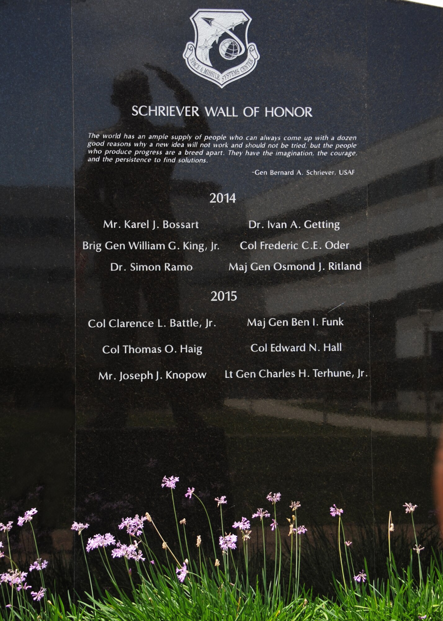 Six early Air Force and civilian space pioneers were honored during a ceremony May 14, 2015 to unveil their names, newly inscribed on a wall of polished black granite at the General Bernard A. Schriever Memorial, located on the grounds of the Space and Missile Systems Center at Los Angeles Air Force base in El Segundo, Calif. (U.S. Air Force photo/Van Ha)