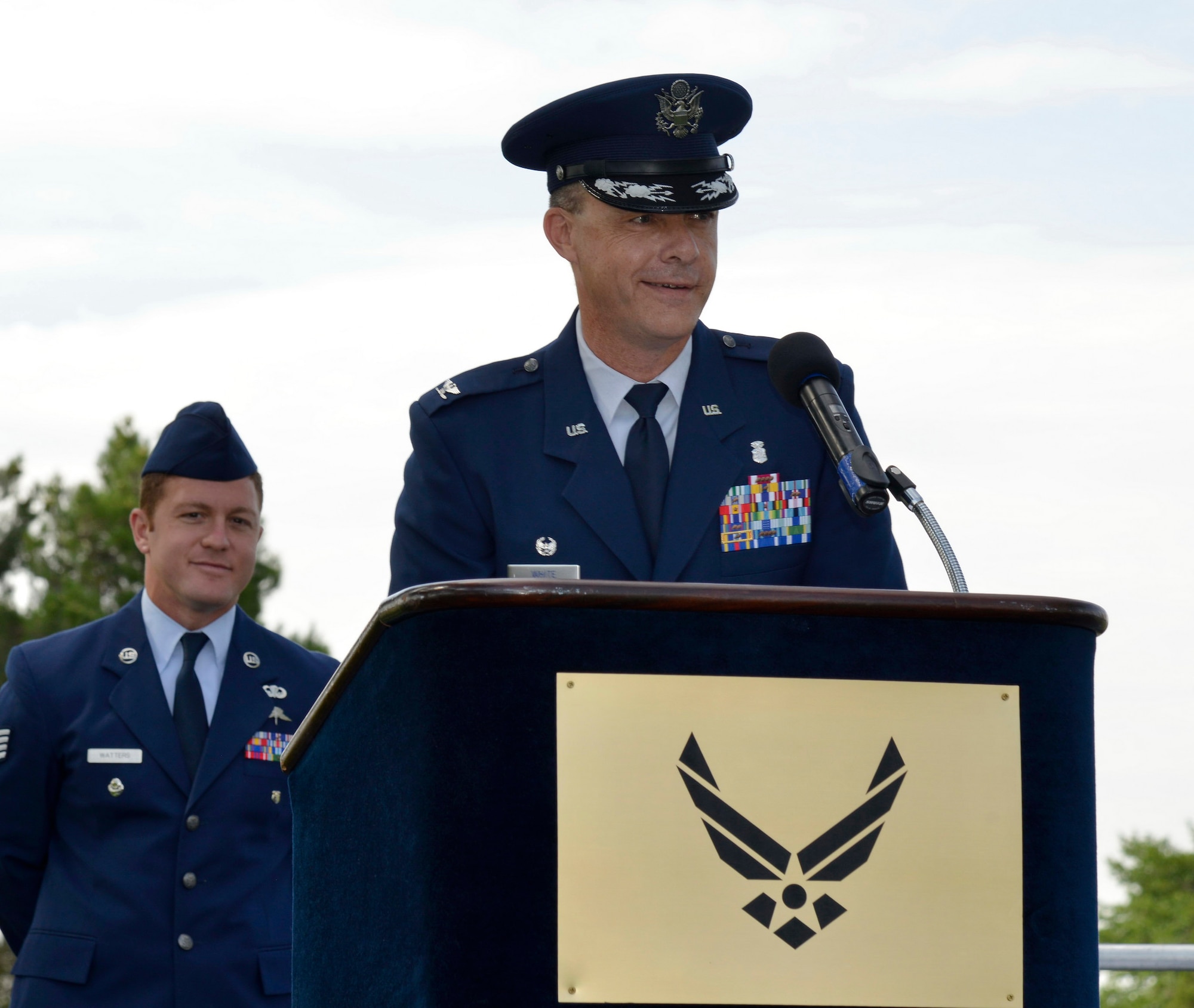 Col. Jeffrey White speaks to the audience at the 377th Medical Group change of command ceremony July 2.  White assumed command, replacing former commander Col. Rachel Lefebvre. (Photo by Jamie Burnett)