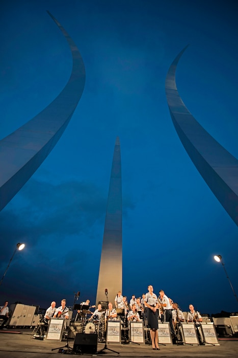 The Airmen of Note performs between the spires of the Air Force Memorial in Arlington, Virginia, in celebration of Independence Day. (U.S. Air Force Photo by A1C Philip Bryant/released)