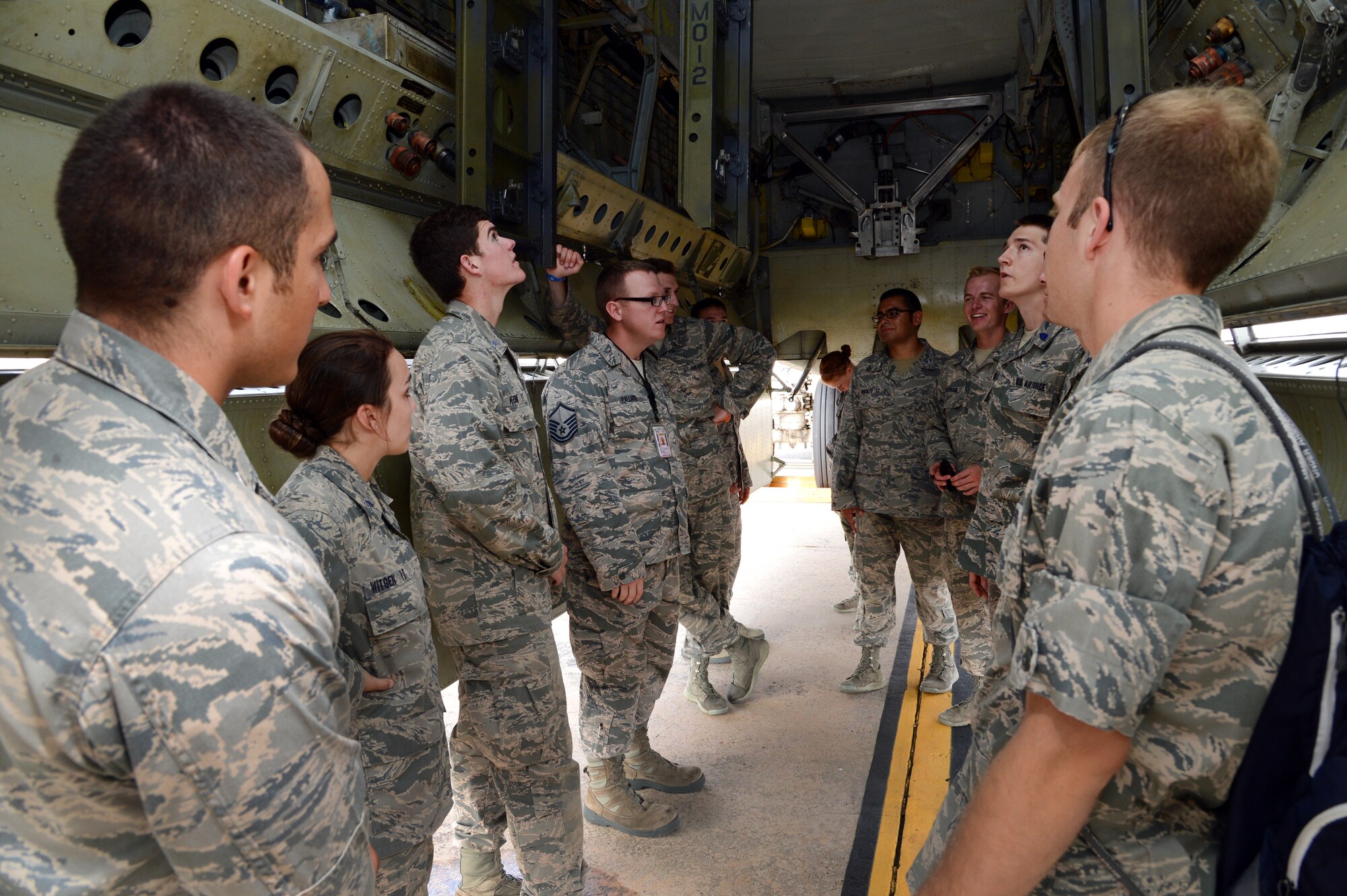Master Sgt. Donald Ballard, 2nd Maintenance Group weapons standardization crew, gives a tour of the bomb-bay of a B-52 Stratofortress for U.S. Air Force Academy cadets on Barksdale Air Force Base, La., July 7, 2015. The cadets visited the base as part of the Operations Air Force Program, which is designed to give cadets an idea of what life is like for the Air Force. (U.S. Air Force photo/Senior Airman Joseph A. Pagán Jr.)