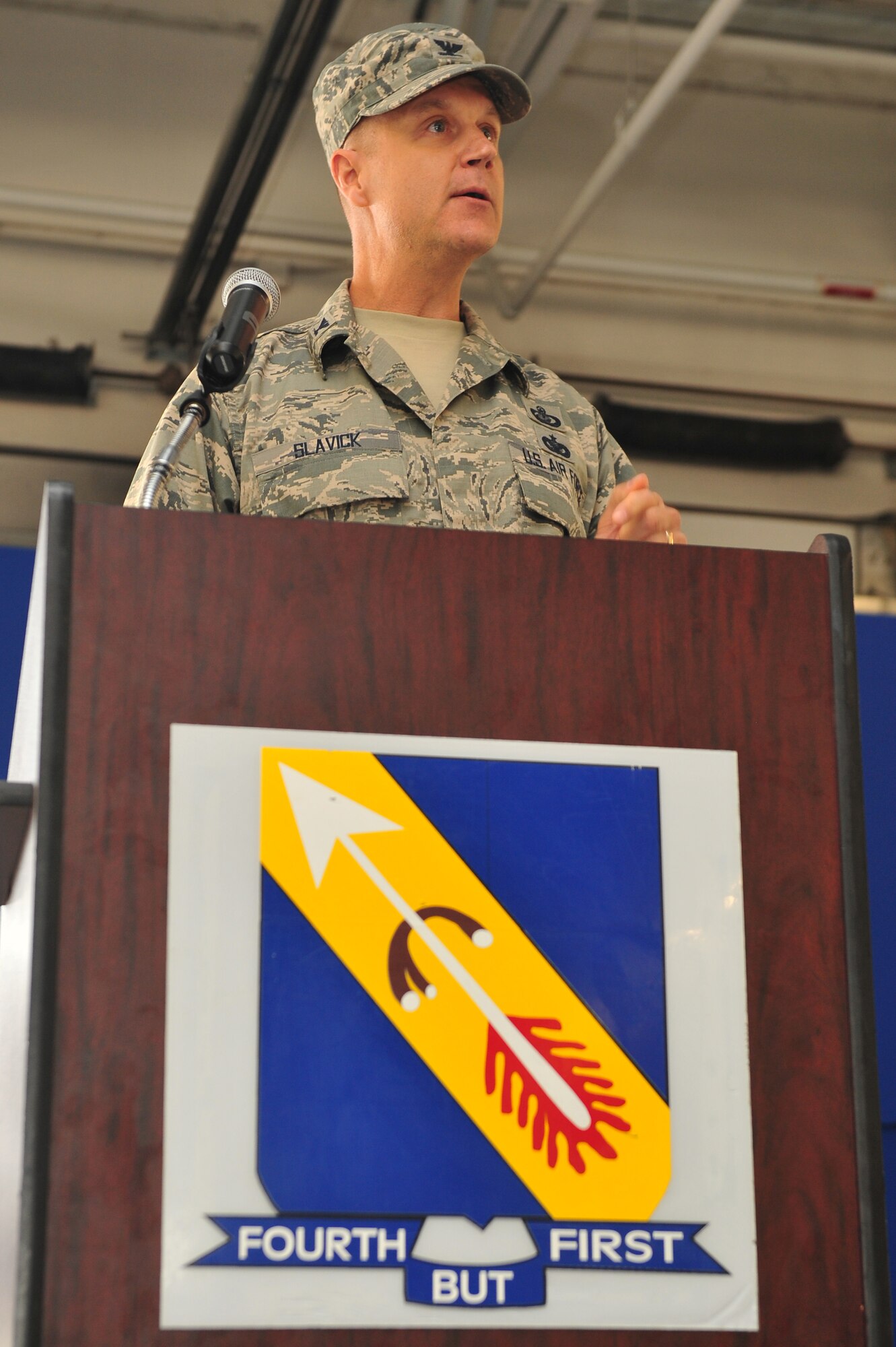 Col. Joe Slavick, incoming 4th Mission Support Group commander, speaks during the 4th MSG assumption of command ceremony, July 8, 2015, at Seymour Johnson Air Force Base, North Carolina. Slavick previously served as the director of the U.S. Forces Afghanistan Joint Visitor’s Bureau, Kabul, Afghanistan. (U.S. Air Force photo/Senior Airman John Nieves Camacho)