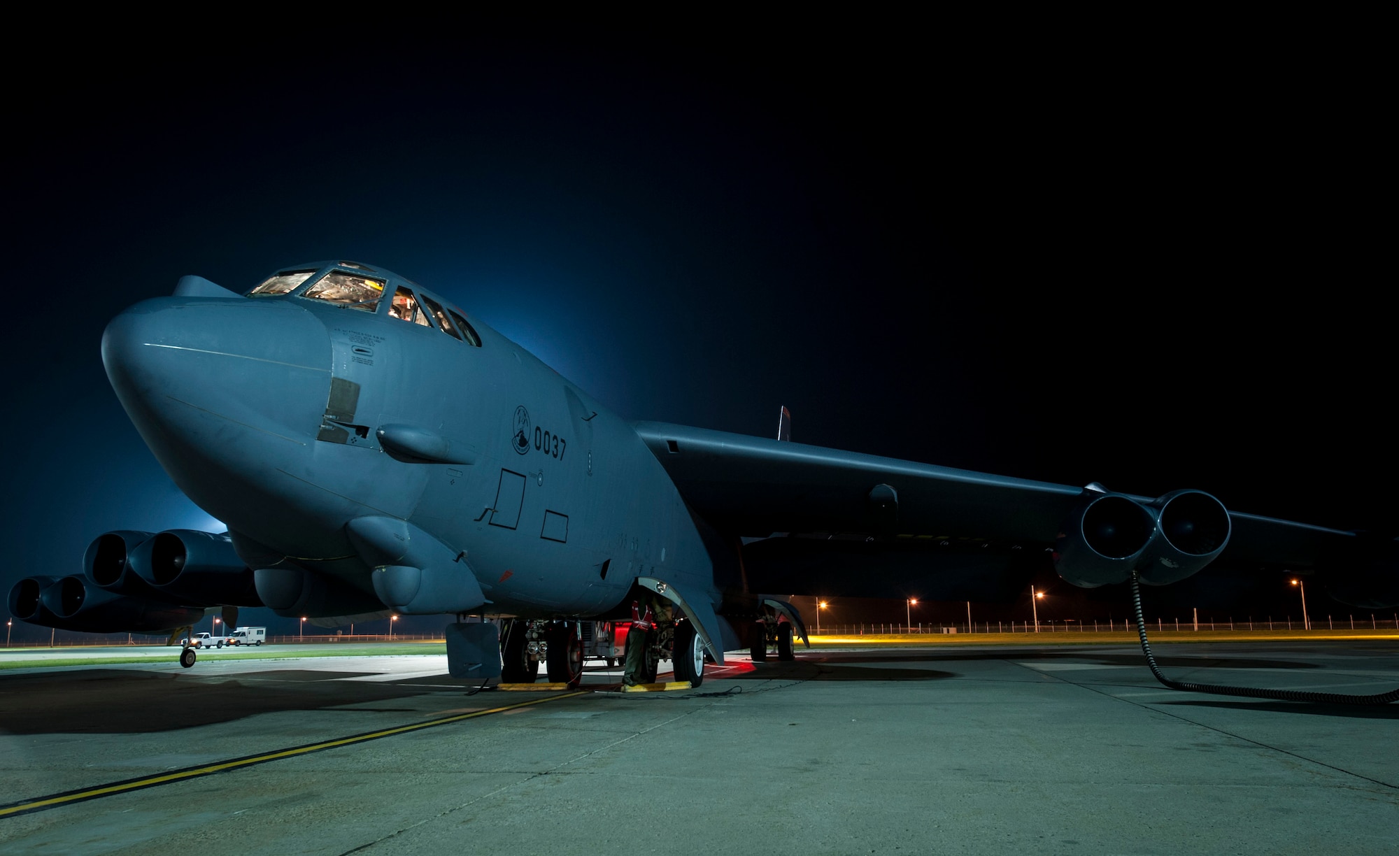 A B-52H Stratofortress sits on the flight line at Minot Air Force Base,
N.D., July 9, 2015. Two crews took flight in the early hours of the morning
to participate in a 16-hour mission in support of an air show in Rio Negro,
Colombia. (U.S. Air Force photo/Senior Airman Stephanie Morris)

